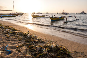 Washed-up plastic and plastic residues on the beach at sunrise, Pantai Sanur, Denpasar, Bali Island, Indonesia, Asia Washed-up plastic and plastic residues on the beach at sunrise, Pantai Sanur, Denpasar, Bali Island, Indonesia, Asia